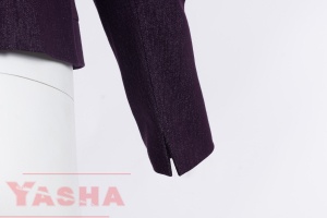 Rounded neckline and front zip with a triangular pull on the purple denim jacket