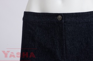 Flat front waistband and metal button on purple denim trousers