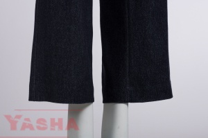Wide, straight leg and hem of purple denim trousers
