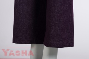Wide, straight leg and hem of purple denim trousers